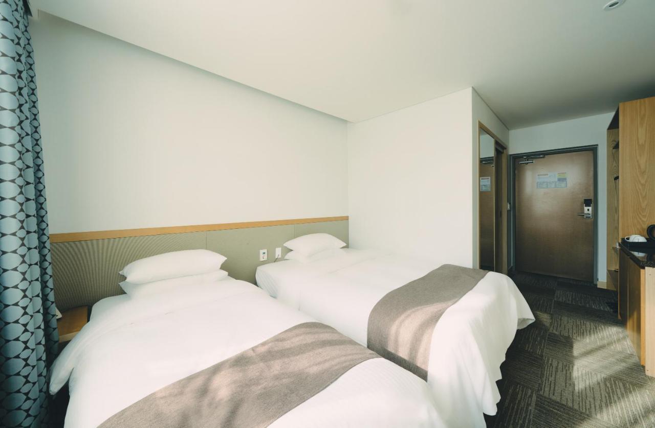 Jeju Poong Gyung Hotel Согвипхо Экстерьер фото